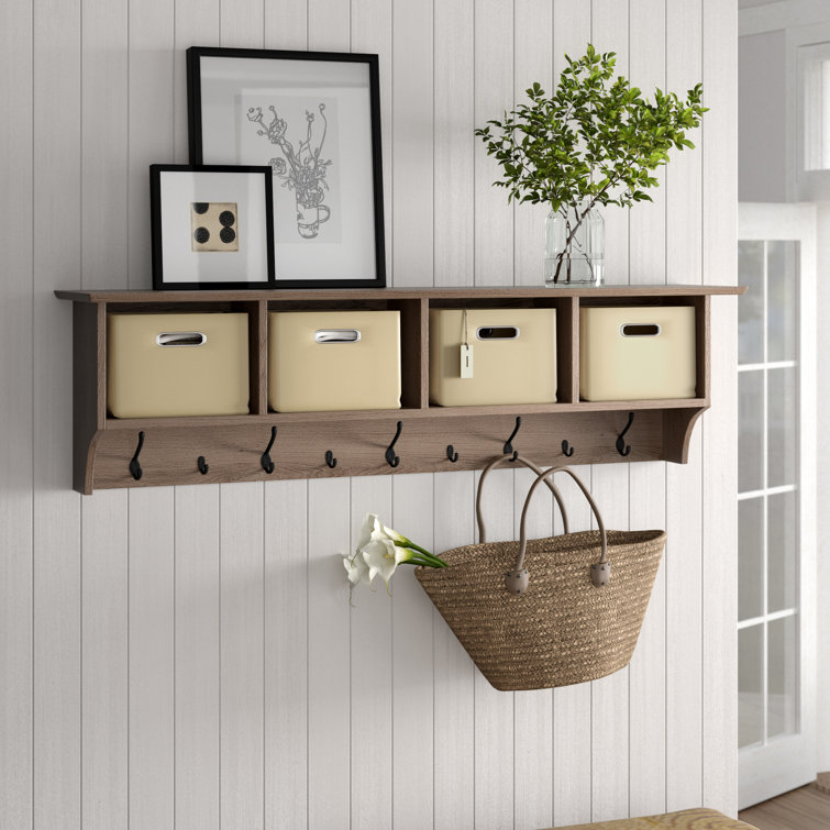 Coat hooks with outlet shelf and baskets